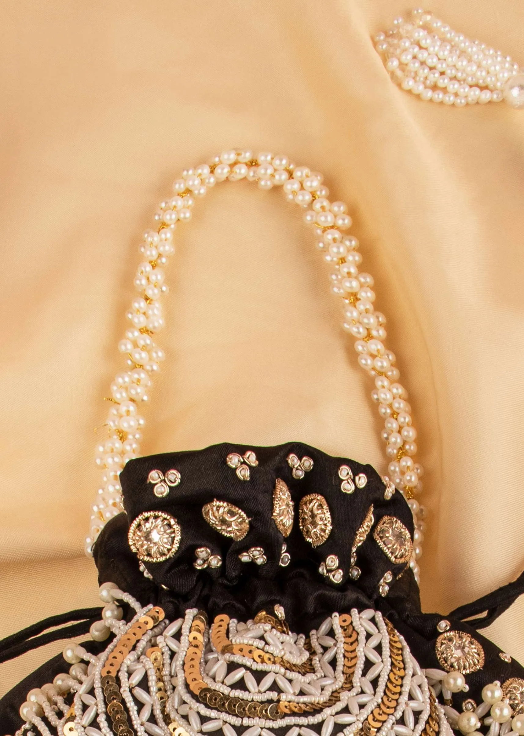 Black Hand Embroidered Potli In Raw Silk