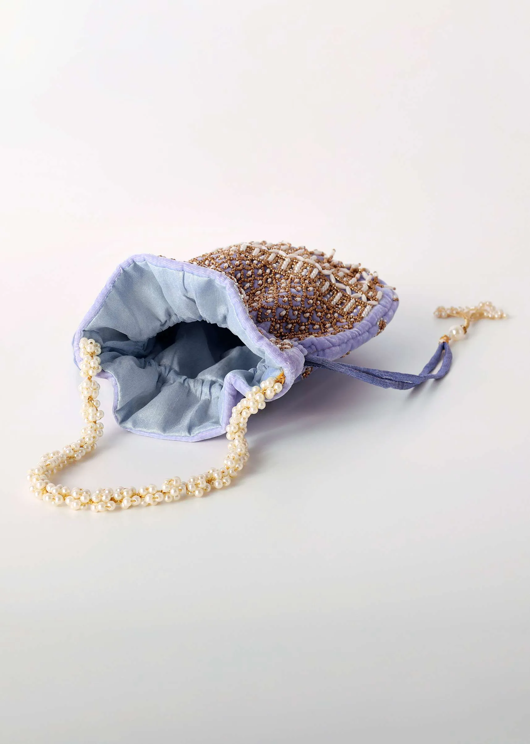 Lavender Potli In Velvet Heavily Embroidered With Beads And Moti Work In Scalloped And Tassel
