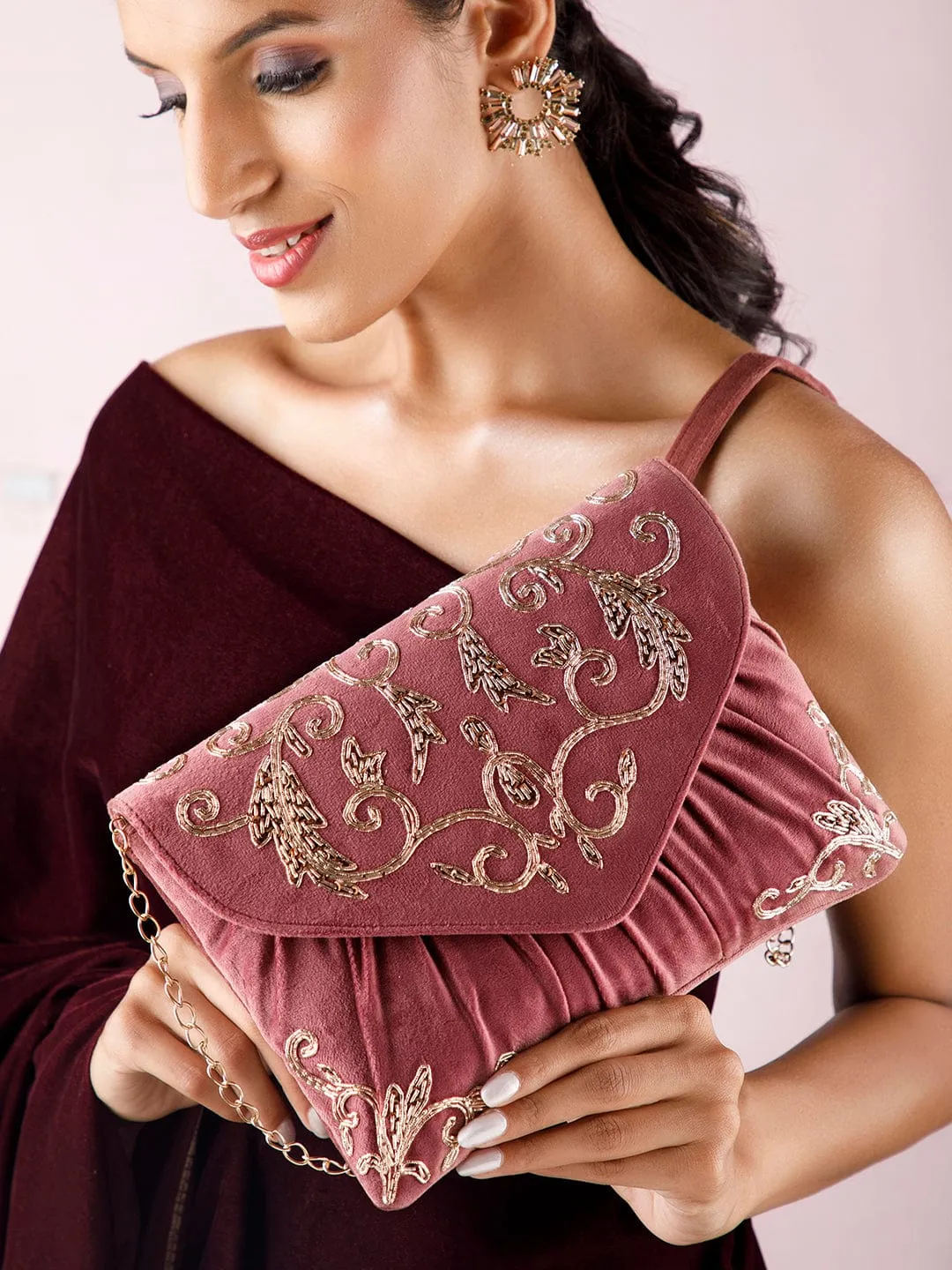 Rubans Dusky Pink Colour Handbag With Embroided Gold And Brown Design.